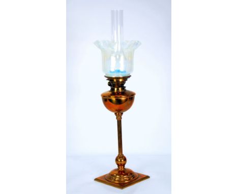 VICTORIAN COPPER TABLE OIL LAMP with slender reeded column and the Vaseline glass frilled shade and the glass funnel, 28" (71