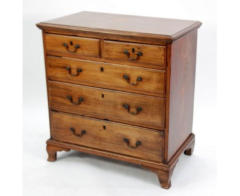 GEORGE III MAHOGANY SMALL CHEST OF DRAWERS, the moulded oblong top above two short and three long, graduated drawers, fitted 