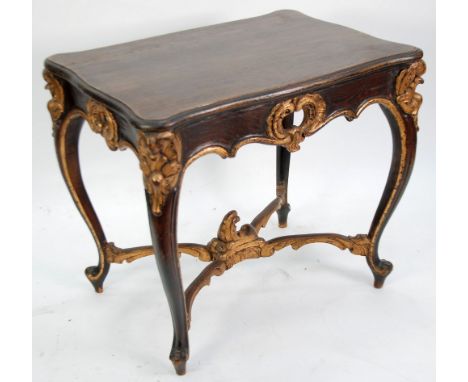 LOUIS XV STYLE DARK STAINED  AND GILDED PINE SIDE OR WINDOW TABLE, the oblong moulded top of serpentine outline, above a shel