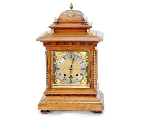 EARLY TWENTIETH CENTURY WALNUTWOOD AND GILT METAL MOUNTED MANTEL OR BRACKET C LOCK, the 6 1/2" brass dial with silver Roman c