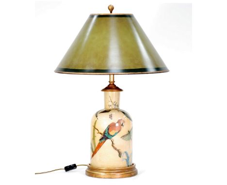 LARGE PRINTED POTTERY BOTTLE SHAPED TABLE LAMP design of parrots and foliage on a gilt circular base/stand and the painted st