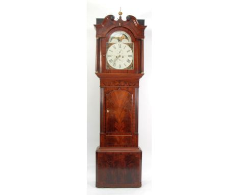 A LATE GEORGIAN LANCASHIRE MAHOGANY LONGCASE CLOCK, the broad trunk with reeded forecorners flanking a shaped top oval moulde