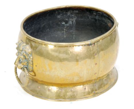 OLD HEAVY BRASS OVAL LOG RECEIVER, with lap joints having copper rivets, large lion mask and ring handles, 1'5" long   