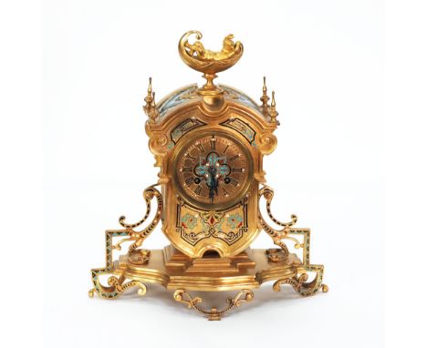 LATE NINETEENTH/EARLY TWENTIETH CENTURY FRENCH GILT BRASS AND CHAMPLEVE ENAMELLED MANTEL CLOCK, the 3 1/2" Roman dial, powere