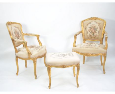 PAIR FRENCH LOUIS XV STYLE GILT WOOD OPEN ARM CHAIRS with floral tapestry fabric back panel, arm rests and stuff over seat on