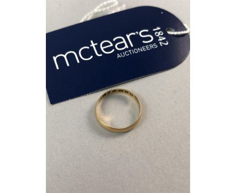 EIGHTEEN CARAT GOLD WEDDING RING