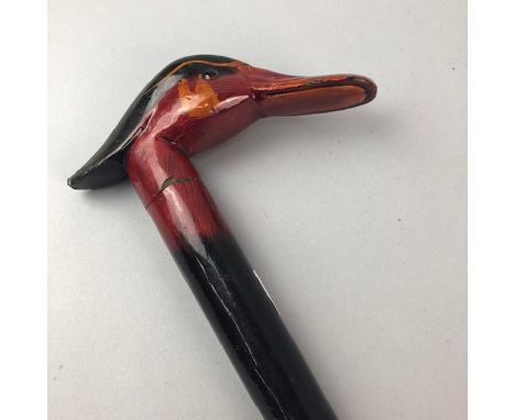 LATE 19TH CENTURY JAPANESE LACQUERED WOOD WALKING STICK, the handle formed as a duck head, 84cm high