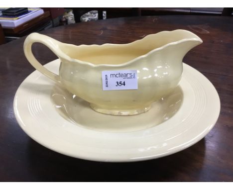 WOOD'S WARE JASMINE PART DINNER SERVICE, along with a J &amp; G Meakin 'Glamour Sunflower' sauce boat