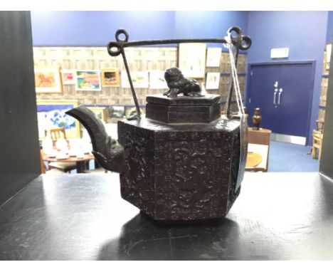 BRONZED TERRACOTTA HEXAGONAL TEA POT, approximately16cm high, the top with foe dog finial