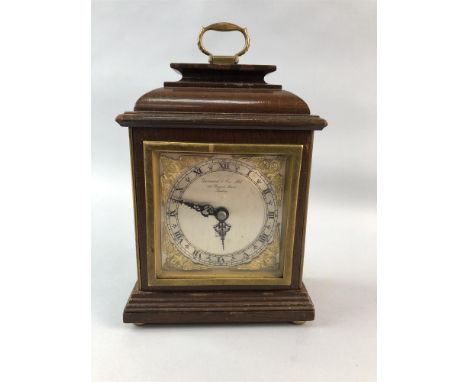 ELLIOT MAHOGANY CASED MANTEL CLOCK, retailed by Garrard &amp; Co Ltd Regent Street, the dial with Roman numerals, 19cm high