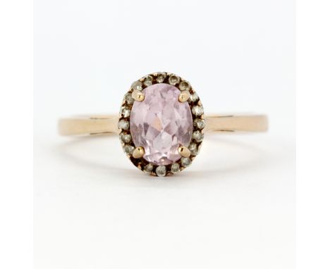 A 9ct rose gold cluster ring set with morganite and diamonds, one diamond missing, with certificate, (T.5).