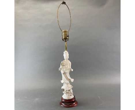 A Chinese Blanc de Chine porcelain table lamp of the Goddess Guanyin, H. 64cm.