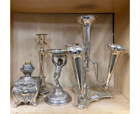 A 19th century silver plated oil lamp base converted for electricity, together with three further silver plated items, talles