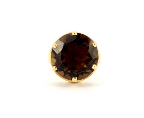 A 1970's 14ct yellow gold (Stamped 585) ring set with smokey quartz, shank a/f, (R).