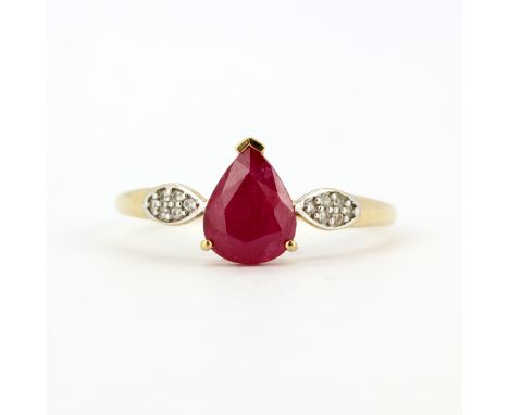 A 9ct yellow gold ring set with a pear cut ruby and diamond set shoulders, (T.5).