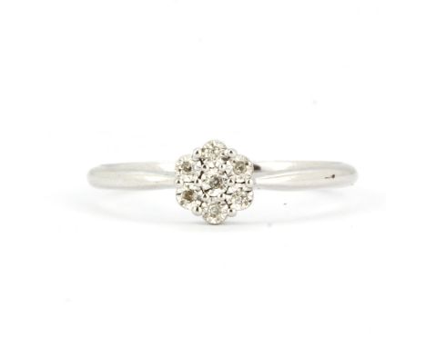 A 9ct white gold cluster ring set with brilliant cut diamonds, ring size O.