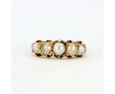 A 9ct yellow gold (stamped 9ct) pearl set ring, (M).