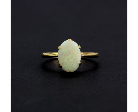 A 9ct yellow gold (stamped 9ct) opal set ring, (R.5).