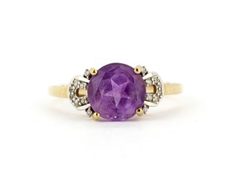 A 9ct yellow gold amethyst and diamond set ring, (T.5).