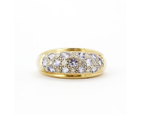 A 14ct yellow and white gold (stamped 14k)  pave set ring set with tanzanites and diamonds, (N).