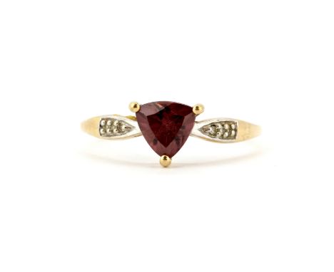A 9ct yellow gold ring set with trillion cut tourmaline and diamond set shoulders, (T.5).