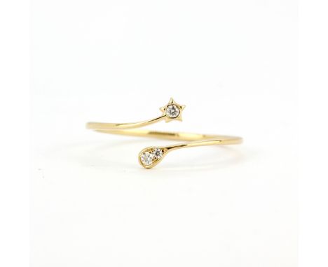 An 18ct yellow gold ring (stamped 750) set with brilliant cut diamonds, (O.5).