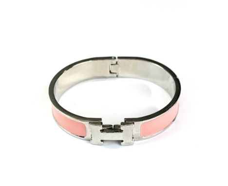A Hermes style enamelled bangle.