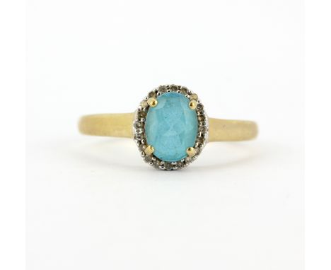 A 9ct yellow gold blue topaz and diamond set cluster ring, (T.5).