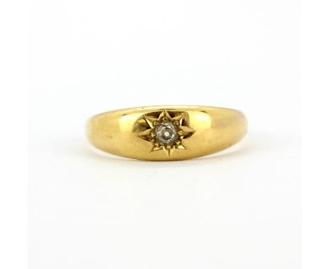 An 18ct yellow gold gypsy ring set with an old cut diamond, (T.5).&nbsp;Approx. 5.3gr.