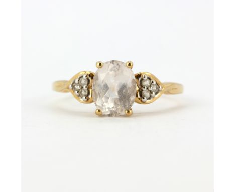 A 9ct yellow gold stone set ring, (T.5).