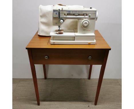 A 'Magic' Singer electric sewing machine table, 79 x 73 x 50cm.
