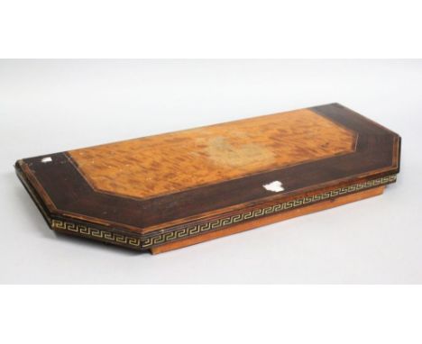 A REGENCY ROSEWOOD AND SATINWOOD BRACKET, the frieze with key pattern inlay. 2ft 7ins wide x 1ft 1ins deep.