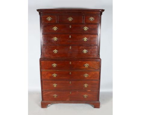 A GEORGE III MAHOGANY SECRETAIRE TALLBOY, the top with three small and three long drawers, pierced brass handles on a base wi