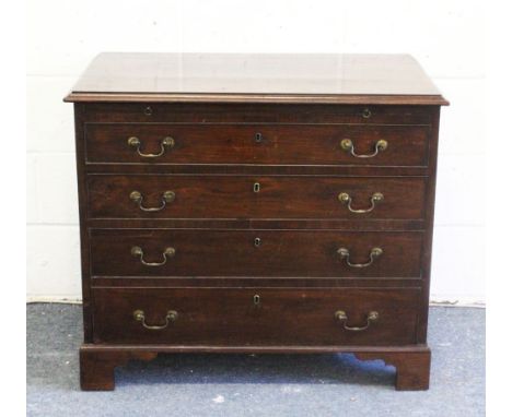 A GOOD GEORGE III MAHOGANY BACHELOR'S CHEST, with a brushing slide, four long graduated drawers with brass swan neck handles,