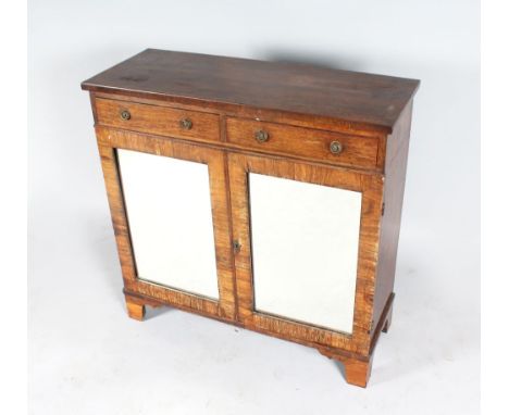 A REGENCY ROSEWOOD CHIFFONIER with plain top, two small frieze drawers with circular brass handles, over a pair of mirrored d