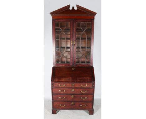 A GOOD GEORGE III MAHOGANY BUREAU BOOKCASE, the top with broken arched pediment and dentil cornice, a pair of glazed astragal