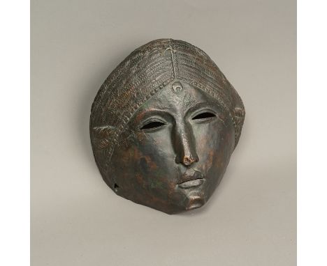 Copper Mask in Ancient Manner, half round shape, with open work and rich chased decorations, light brown patina, partly coron