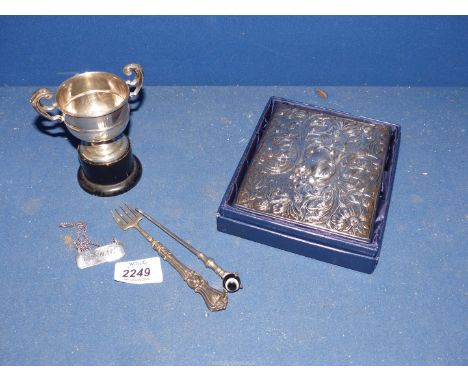 A small quantity of silver including small sterling silver trophy on stand, 925 silver Cognac decanter label, fork with silve