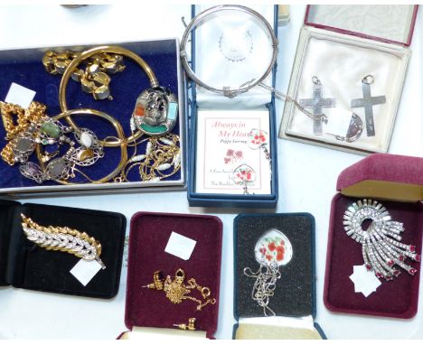 A silver bangle; a locket; 2 crucifixes; a selection of other jewellery