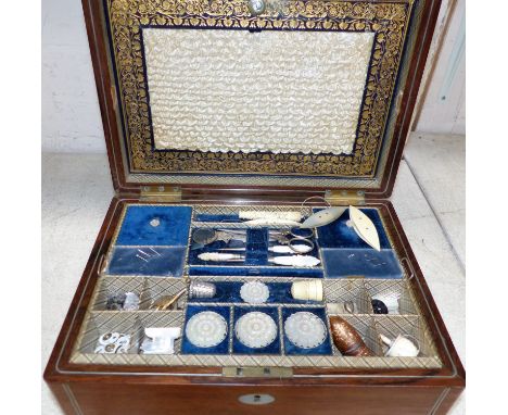 A 19th century mahogany brass inlaid workbox with mother-of-pearl and ivory fitments, etc., fitted interior
