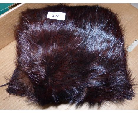 An Edwardian fur muff; a part albino blackbird, stuffed; a collection of shells