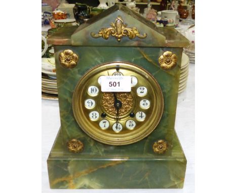 An ormolu mounted architectural onyx French mantel clock with gilt dial and striking drum movement 