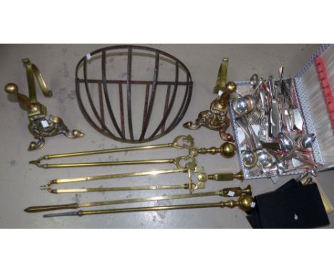 Four brass fire irons and dogs; a wall bracket; silver plated cutlery