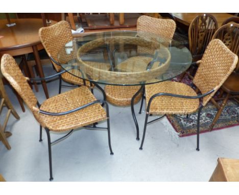 A tubular metal and glass dining suite comprising circular table and 4 woven cane chairs, and 3 height occasional table/shelf