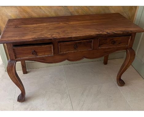 A console table with three drawers to centre on cabriole legs (H78cm W130cm D54cm)