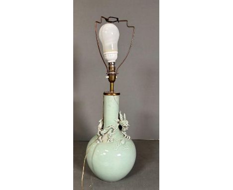 A Celadon Chinese vase with dragon decoration converted to a lamp base. AF (Height excluding light fitting 33cm)