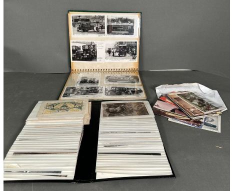 A selection of Vintage postcards, various themes loose and in two albums including World War I and motoring.