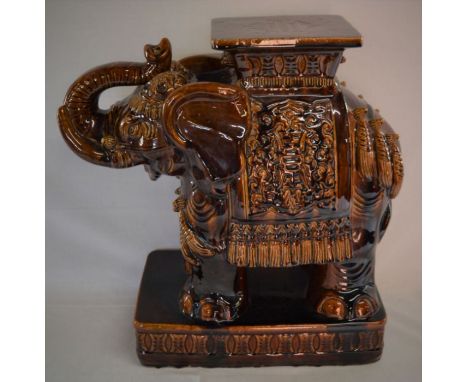 Large brown ceramic elephant stand. Ht 58cm