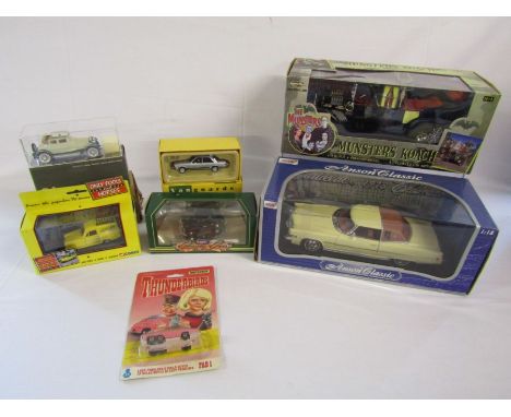 Collection of toy cars to include Munsters Koach 1:18 scale, Anson 1973 Cadillac Eldorado 1:18 scale, Vanguard Ford Granada e