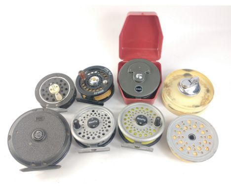 A selection of fly reels to include Intrepid, Super Condex, BF800b and others.  Lot also includes a table cigarette lighter w